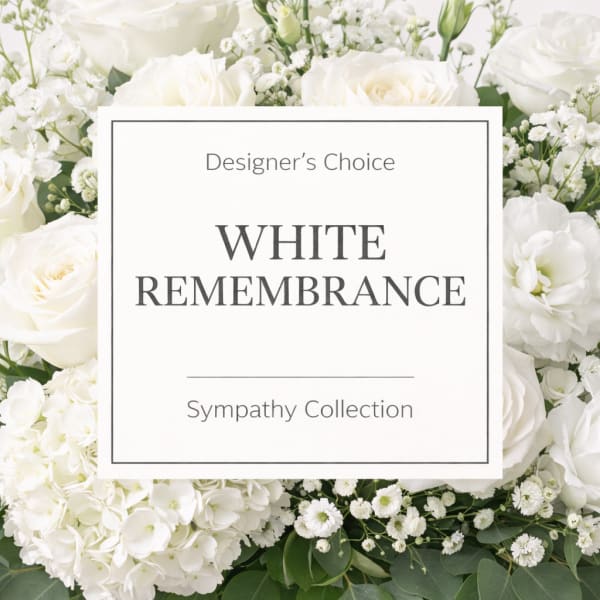 White floral sympathy arrangement with roses and hydrangeas