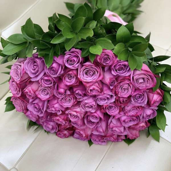 Bouquet of pink roses with green foliage