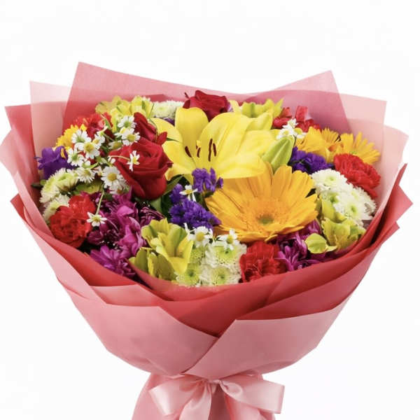 Colorful mixed bouquet with roses, lilies, and daisies wrapped in pink paper
