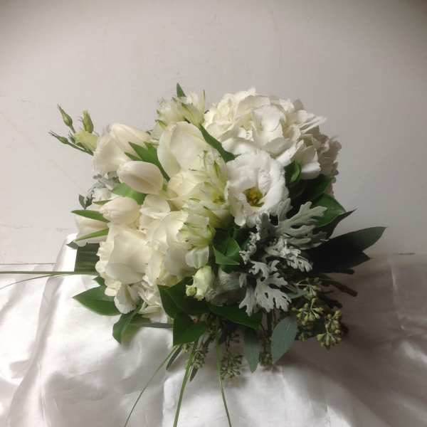 White bouquet with tulips and hydrangea-like blooms
