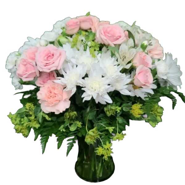 Pink roses and white daisies in a green glass vase