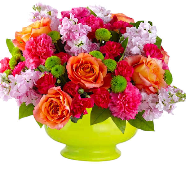Mixed bouquet of orange roses, pink carnations, and lavender blooms in a lime green vase