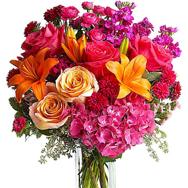 Bouquet of pink roses, orange lilies, and hot pink hydrangeas in a clear vase