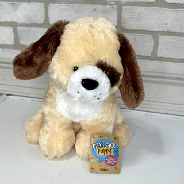 Plush puppy toy with a tag attached