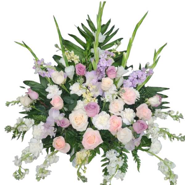 Large bouquet of pastel roses and white flowers with tall green spikes