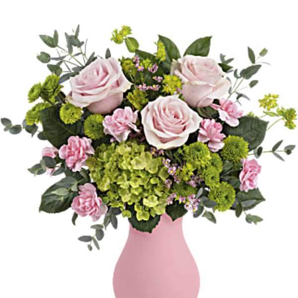 Pink roses and green hydrangeas in a pink vase