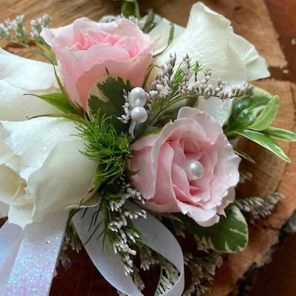 White and pink corsage
