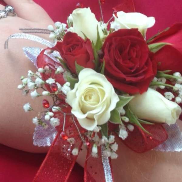 White and red corsage