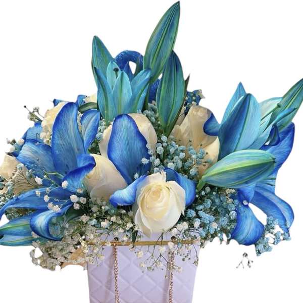 Blue and white floral arrangement in a lavender quilted box
