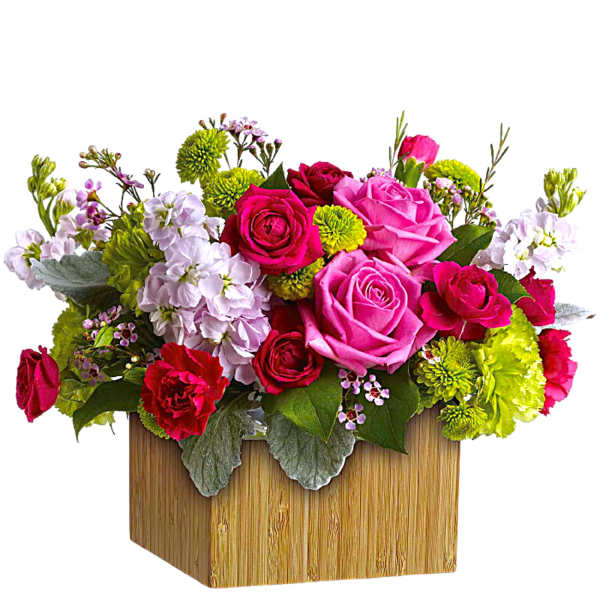 Bright mixed flower arrangement in a square wooden box