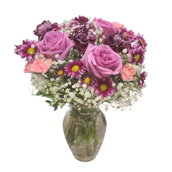 Pink and purple bouquet in a glass vase