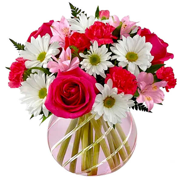 Pink and white mixed bouquet in a round glass vase