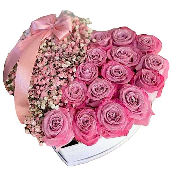 Pink roses arranged in a heart-shaped box with a satin ribbon