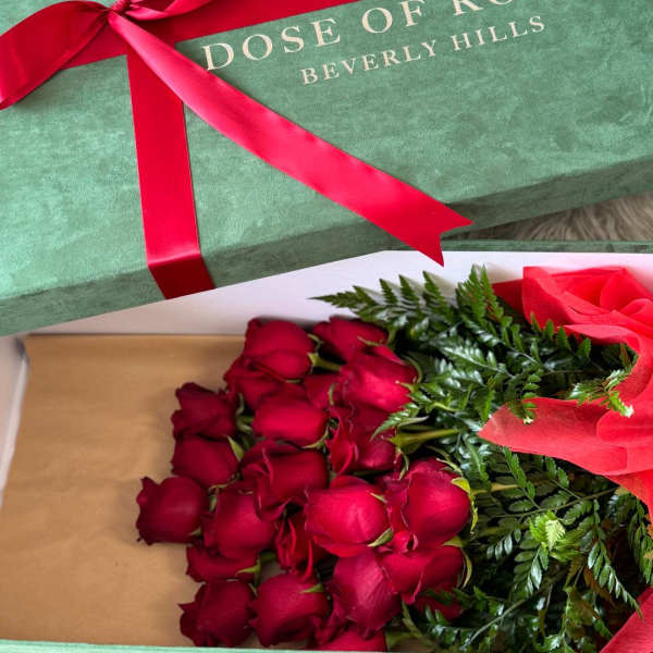 Box of red roses tied with a red ribbon