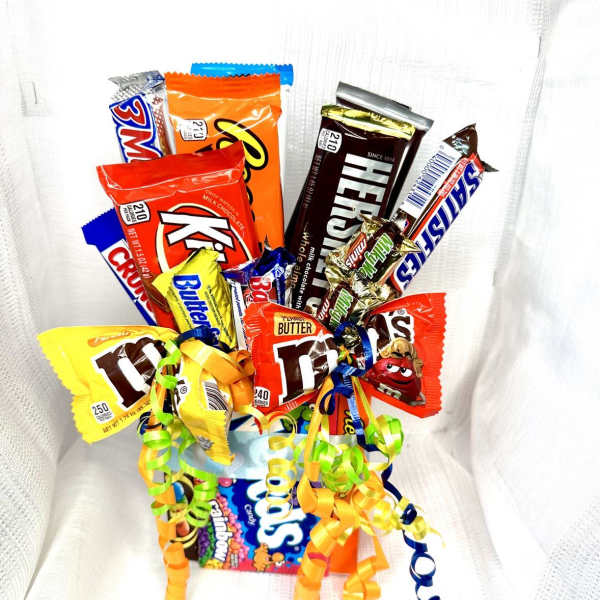 Candy bouquet with assorted chocolate bars and rainbow curling ribbons