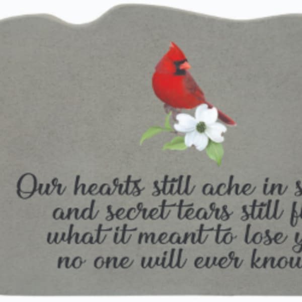 Gray memorial plaque with a red cardinal and white flower graphic