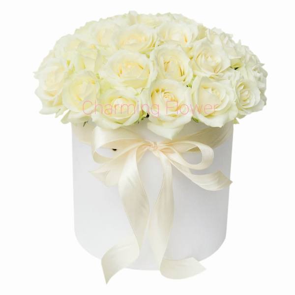 White rose bouquet in a round white box with a ribbon bow