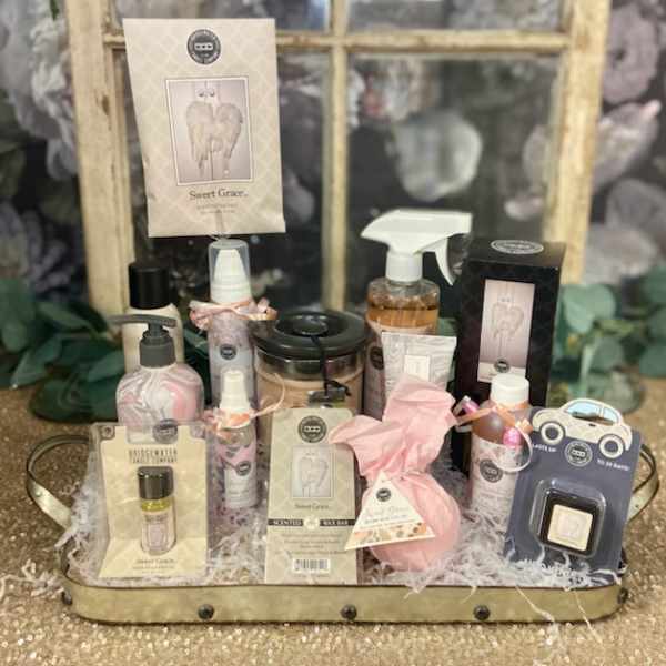 Gift basket of bath and body products with pink packaging