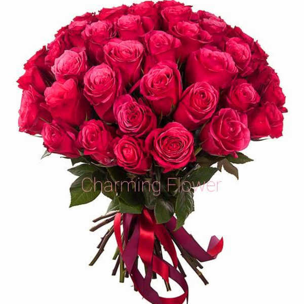 Bouquet of red roses tied with a red ribbon