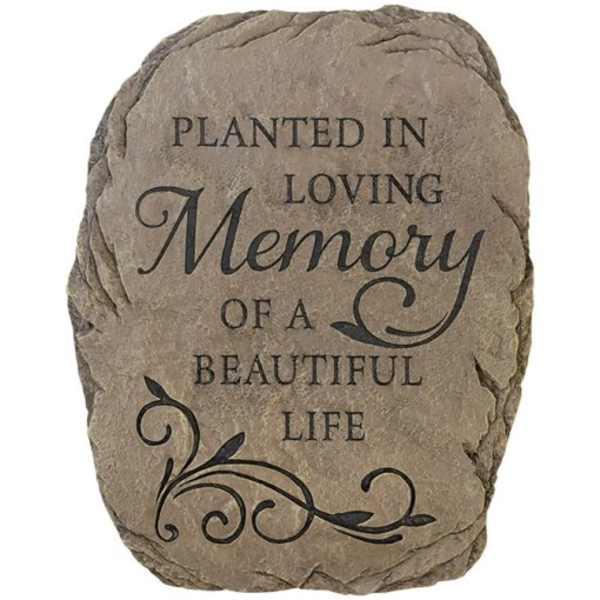 Memorial stone engraved with the words "Planted in Loving Memory of a Beautiful Life"