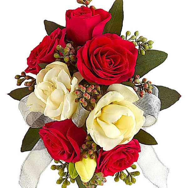 Bouquet of red and ivory roses with ribbon accents
