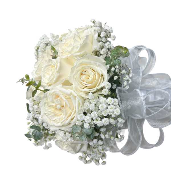 White rose bouquet with baby's breath and a silver ribbon