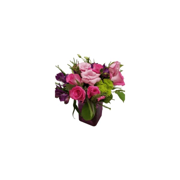 Pink and purple mixed bouquet in a dark vase