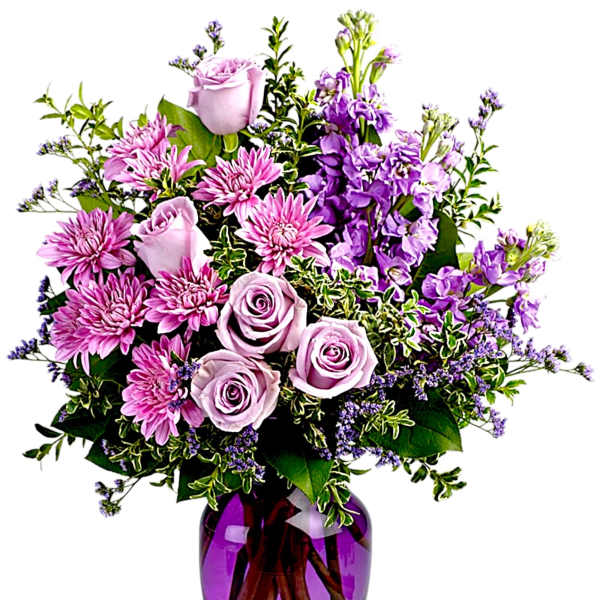 Pink and lavender flowers arranged in a purple glass vase