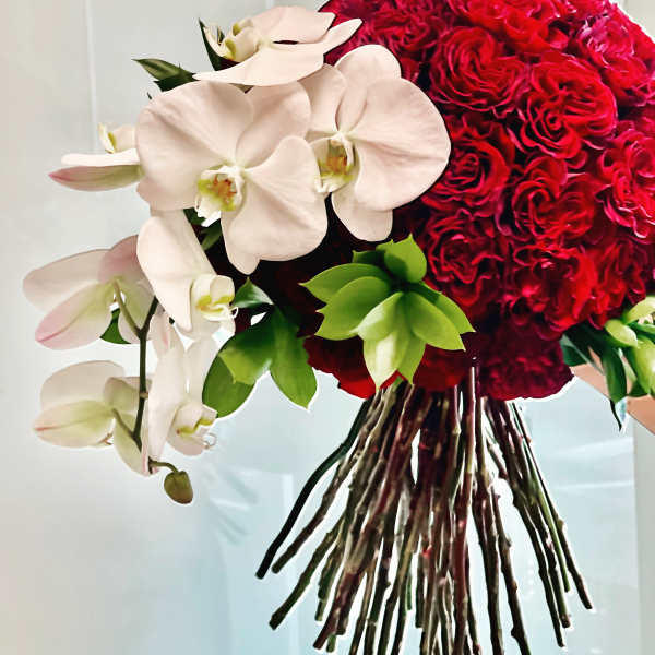Red rose bouquet with white orchids