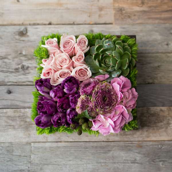 Square succulent and rose arrangement in pink and purple tones