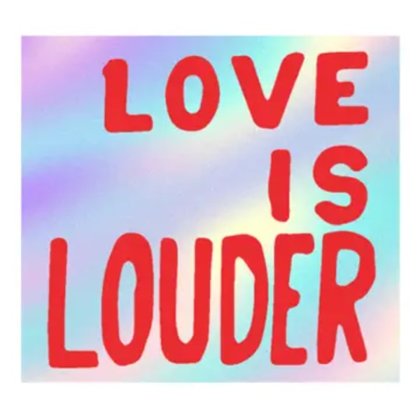 Rainbow sign with red text reading "LOVE IS LOUDER"