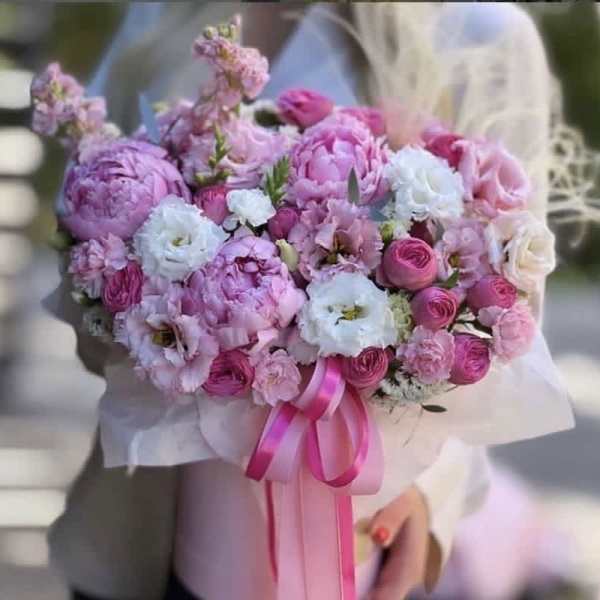Pink and white bouquet with ribbon wrap