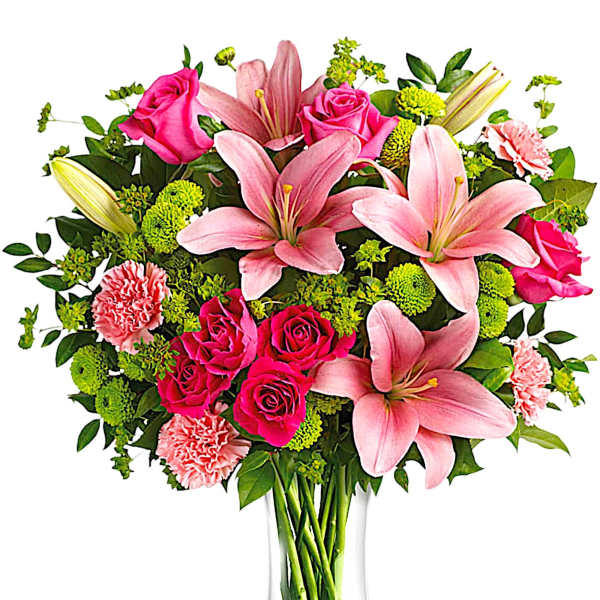Pink lilies and roses in a clear glass vase