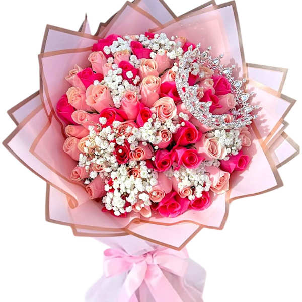 Pink rose bouquet with a silver tiara and pastel wrapping