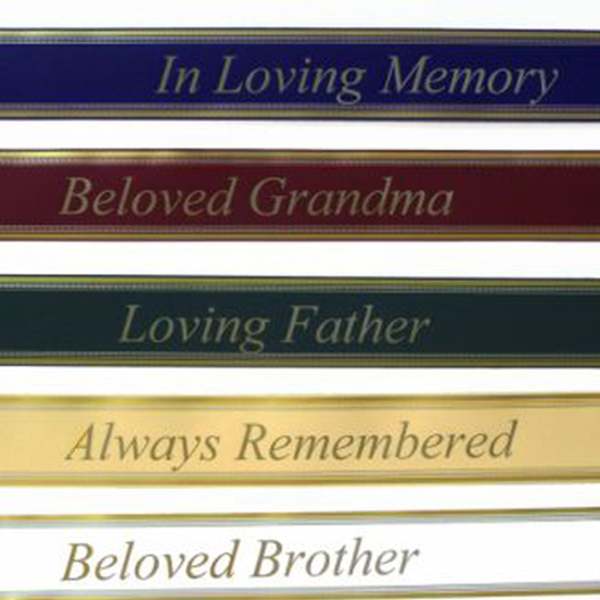 Memorial ribbons with phrases like In Loving Memory and Beloved Grandma