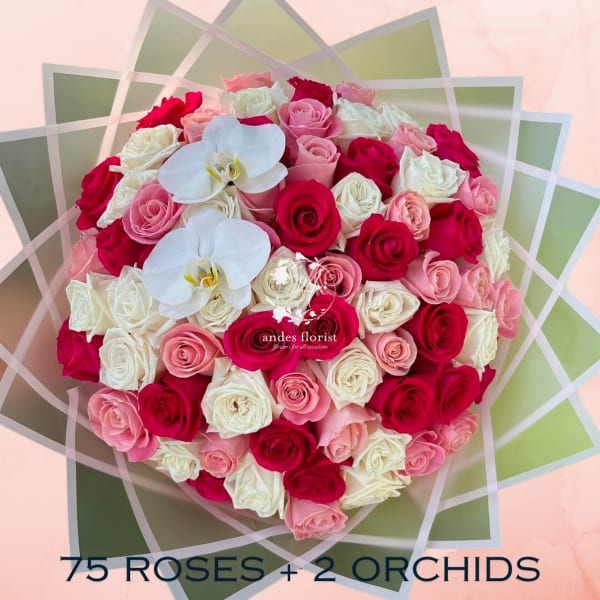 Heart-shaped bouquet of pink, red, and white roses with two white orchids