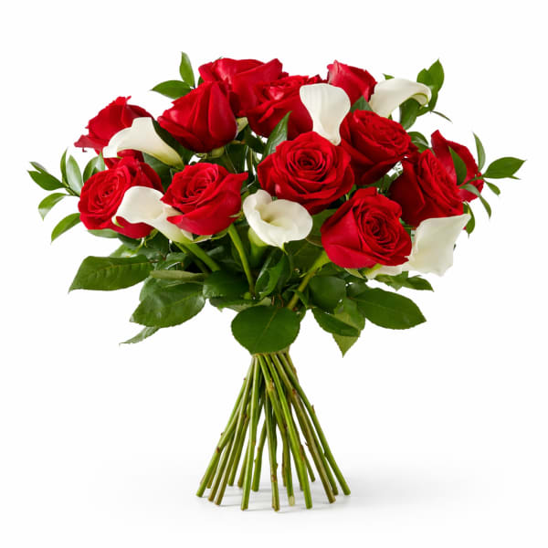 Bouquet of red roses and white calla lilies