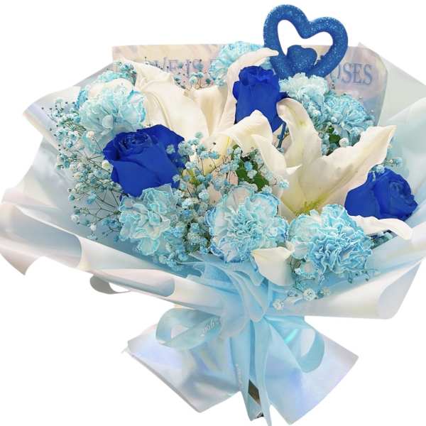 Bouquet of blue and white flowers with a heart topper