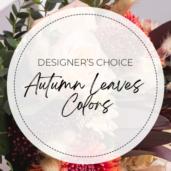 Designer’s choice autumn leaves colors floral arrangement