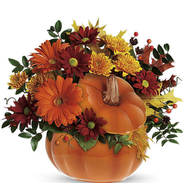 Pumpkin-shaped vase with orange and burgundy flowers