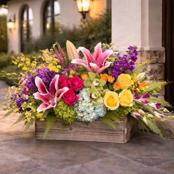 Colorful flower arrangement in a wooden planter box