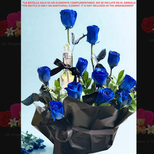 Bouquet of blue roses wrapped in black paper with a bottle centerpiece