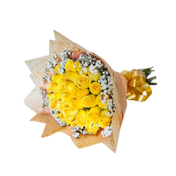 Bouquet of yellow roses with white baby's breath in peach wrapping