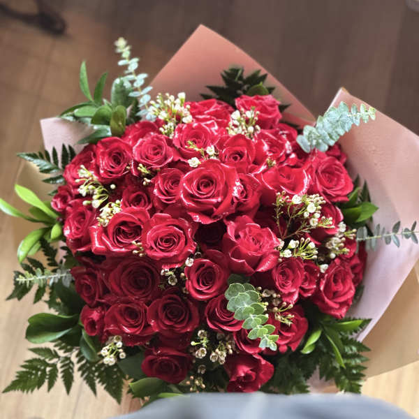 Two Dozen Roses Hand Tied