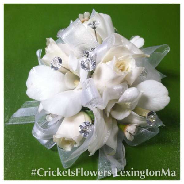 White rose and orchid bouquet with silver ribbon and rhinestones