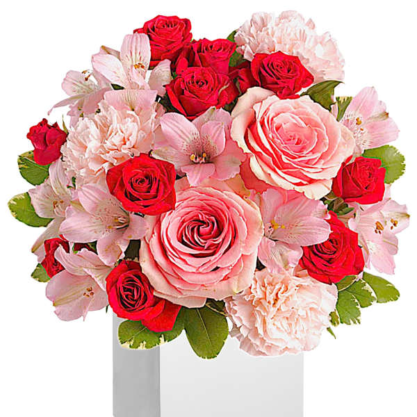 Pink and red rose bouquet in a white box vase