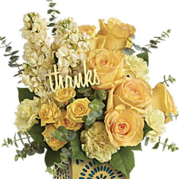 Yellow roses and carnations in a decorative box with a "thanks" sign