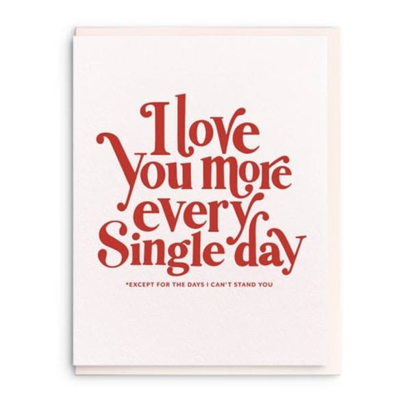 Greeting card with red text reading "I love you more every single day"