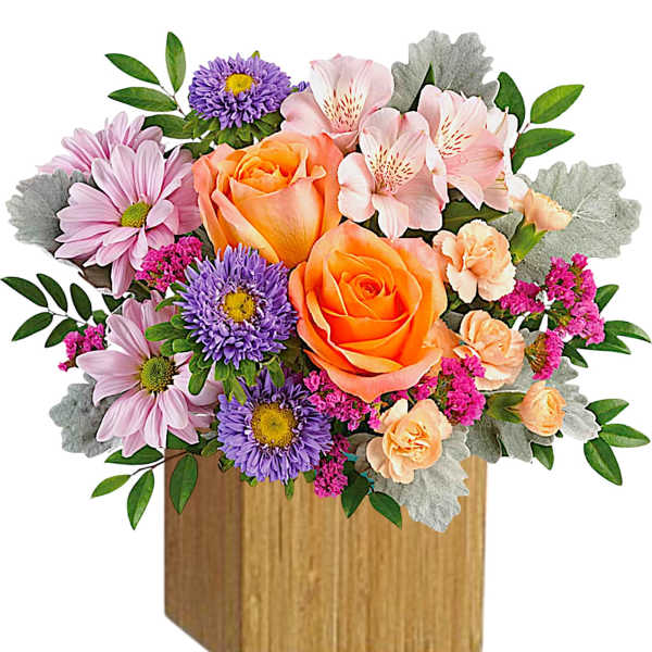 Mixed bouquet with orange roses, pink daisies, and purple asters in a wooden box