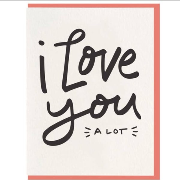 Greeting card with the words "i love you a lot" in black script